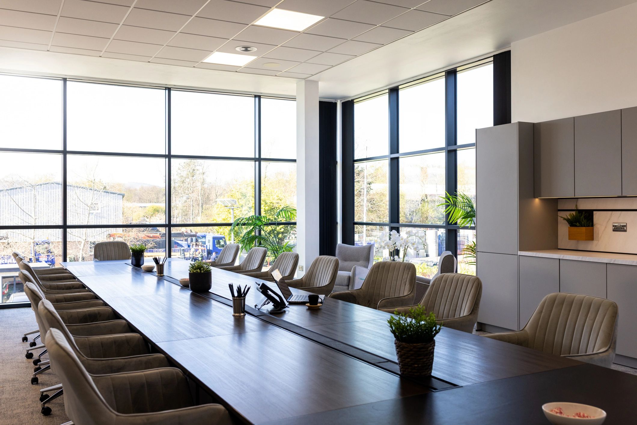 Quiet modern meeting room with natural light and a calm professional atmosphere